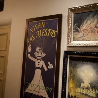 Framed Vintage Fiesta Poster and Religious Art Display