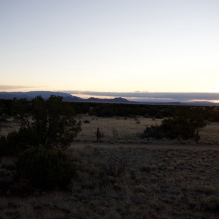 Desert Sunset Over Distant Mountains in New Mexico