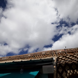 Adobe Architecture Under Dramatic Desert Sky