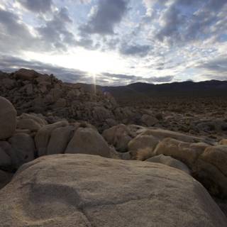 Rocky Landscape Shines under Sunlight Flares