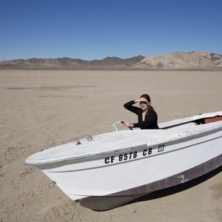 Lost at Sea: Boat Stranded in Desert Wasteland