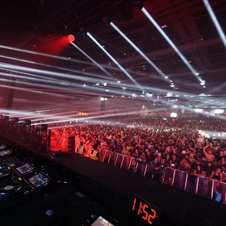Massive EDM Crowd Erupts Under Laser Light Show