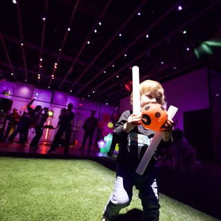 Young Child Celebrates at Baby Rave Dance Party