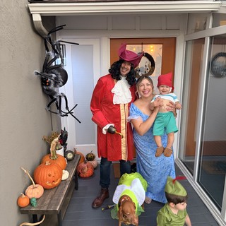Peter Pan Family Halloween Costume on Decorated Porch