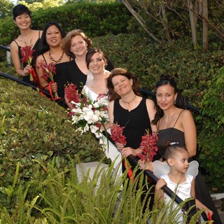 Bridal Party Poses on Garden Staircase Wedding Day