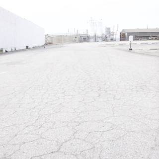 Parking Lot with White Building