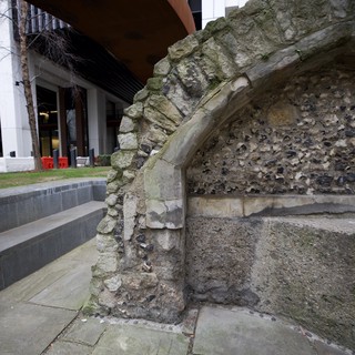 Ancient Stone Arch Preserved in Modern London Architecture