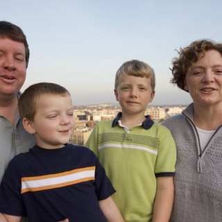 Family Portrait on Rooftop at Dusk