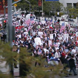 Patriotic Protesters March with American Flags and Signs