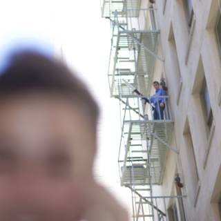 Blurry Man on Fire Escape