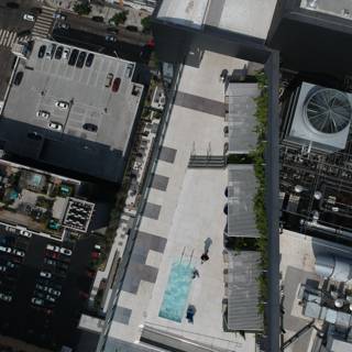 Cityscape with a Pool and a Car