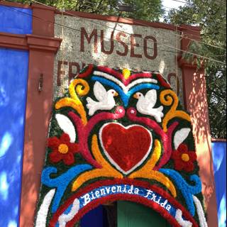 Colorful Heart and Bird Mural on Miguel Hidalgo Building