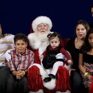 A Festive Family Portrait with Santa Claus