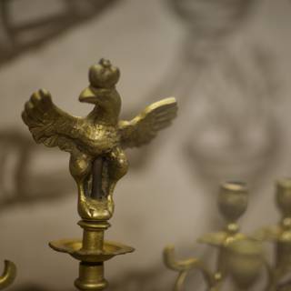 The Golden Bird on a Candle Holder