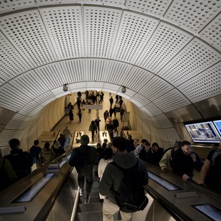 Rush Hour Commuters on London Underground Escalator