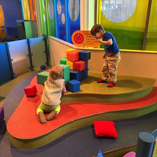 Children Playing in Colorful Museum Toddler Zone