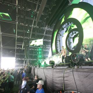 Green and White Logo on Large Screen at Coachella 2015