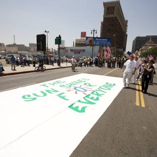Save Our Environment Banner in the Metropolis