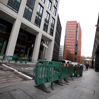 Modern Urban Development with Green Construction Barriers in London