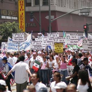 Protesters March through City with Signs and Flags
