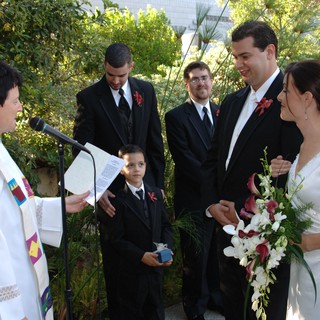 Outdoor Wedding Ceremony with Bridal Party and Officiant