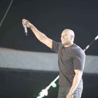 Dr. Dre Takes the Stage with Microphone in Hand