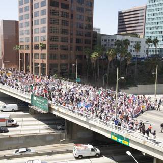 Mayday Rally Draws Crowds to City Overpass