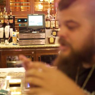 Bearded Man Enjoying a Drink at the Pub
