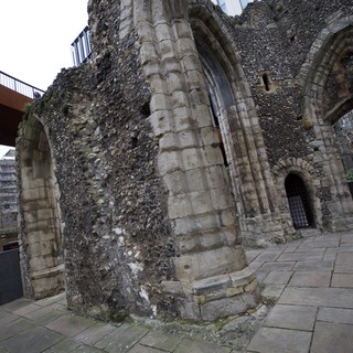 Medieval Church Ruins with Modern Urban Architecture