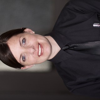 Professional Woman in Black Uniform Portrait