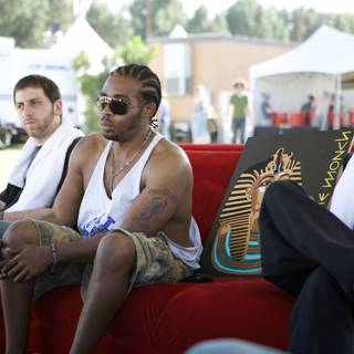 Pharoahe Monch lounges on a couch at Coachella