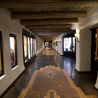 Southwestern Adobe Corridor with Decorative Tile Runner