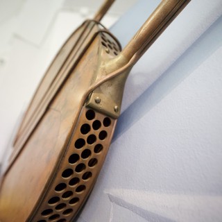 Vintage Brass Telephone Handset Close-Up Detail
