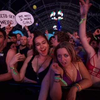 Sign-holding Crowd at Coachella Music Festival
