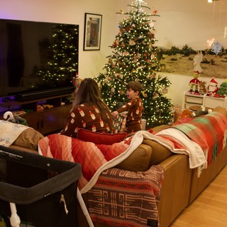 Cozy Christmas Morning with Mother and Child