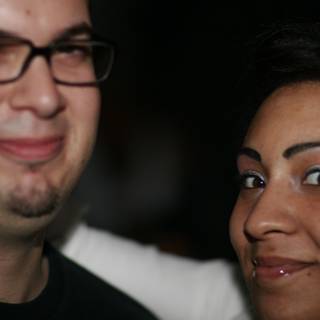 Smiling Couple with Stylized Eyeglasses