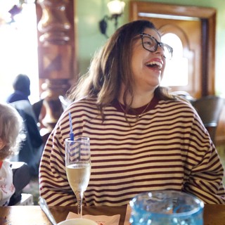 Joyful Celebration at Restaurant with Family
