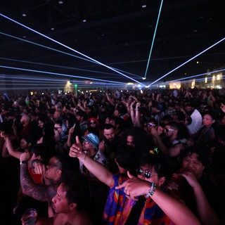 Massive Crowd Electrified by Laser Light Show