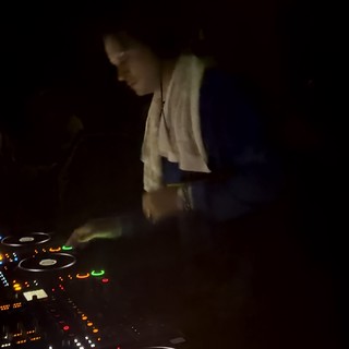 DJ Performance in Darkened London Nightclub