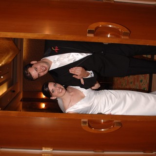 Newlyweds Emerge Through Grand Wooden Doors