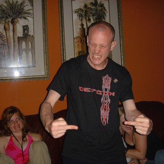 Defcon Attendee Strikes Fierce Pose at House Party