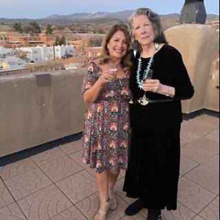 Two Women Toasting to the Blue Sky in Santa Fe