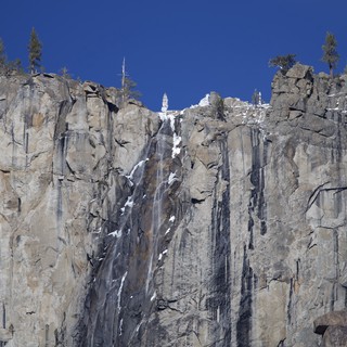 Frozen Waterfall Cascading Down Yosemite's Granite Cliffs