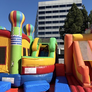 Colorful Inflatable Bounce House at Urban Outdoor Event