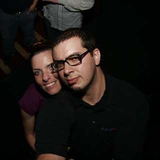 Dave and Penelope Sharing a Moment at Night Event