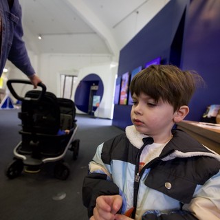 Young Boy Exploring Modern Museum Gallery Space