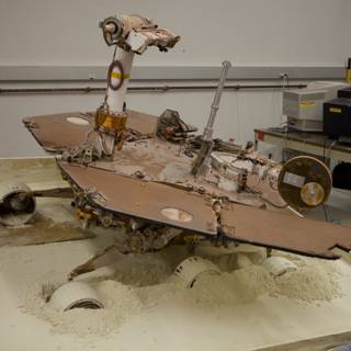 Miniature Rover Model on Wooden Table