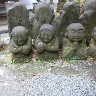 Stone statues with faces