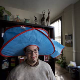 Hat-wearing Man Enjoys Indoors