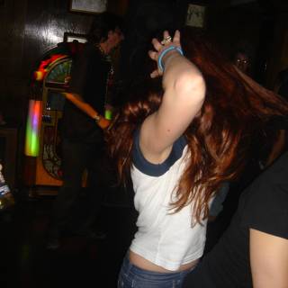 Red-Haired Beauty Enjoys Nightlife with Friends